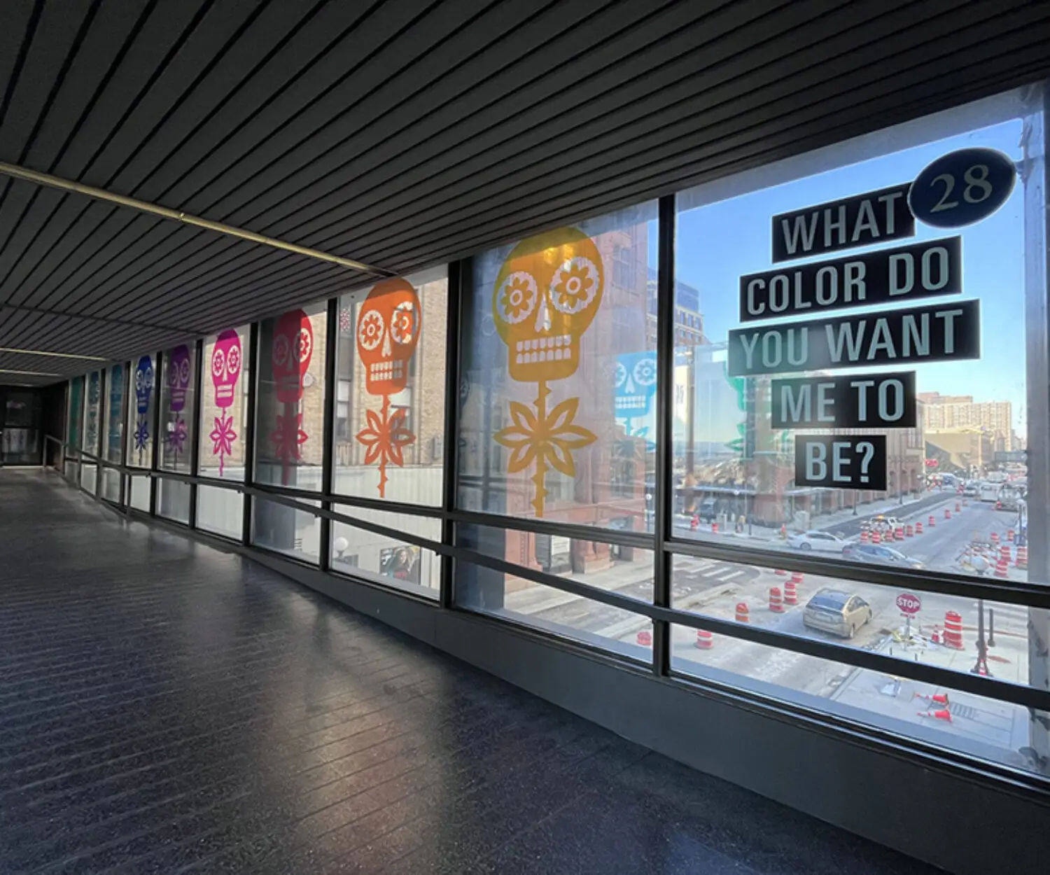 Photos of a Skyway. Public Art in Saint paul, Minnesota by artist Luis Fitch Challenging racial perceptions through color, symbolism, and public dialogue.