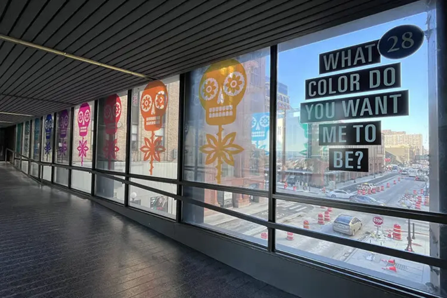 Photos of a Skyway. Public Art in Saint paul, Minnesota by artist Luis Fitch Challenging racial perceptions through color, symbolism, and public dialogue.