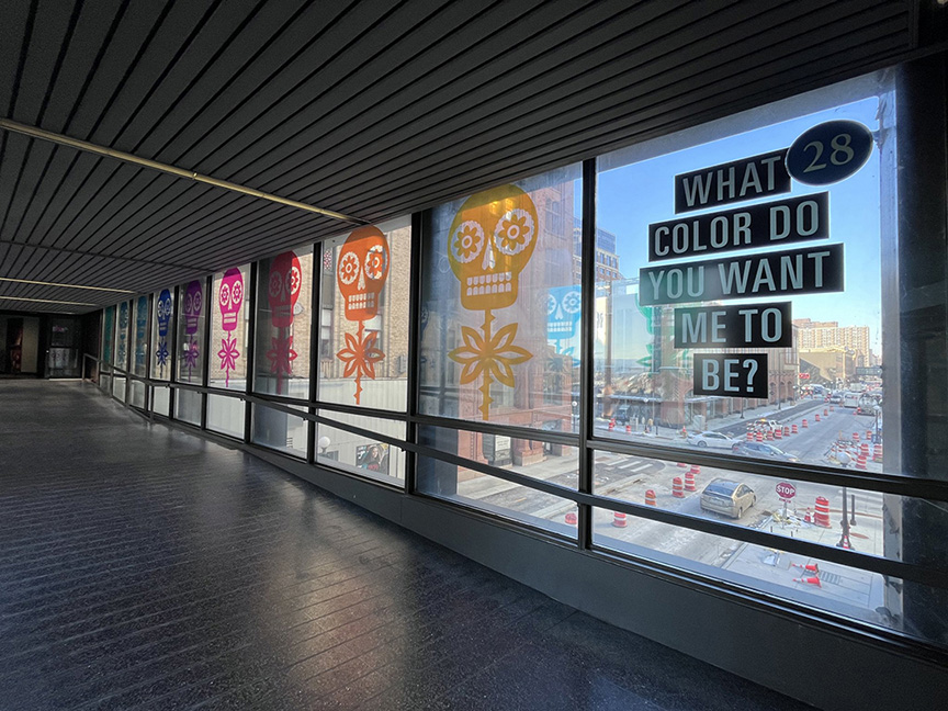 Photos of a Skyway. Public Art in Saint paul, Minnesota by artist Luis Fitch Challenging racial perceptions through color, symbolism, and public dialogue.