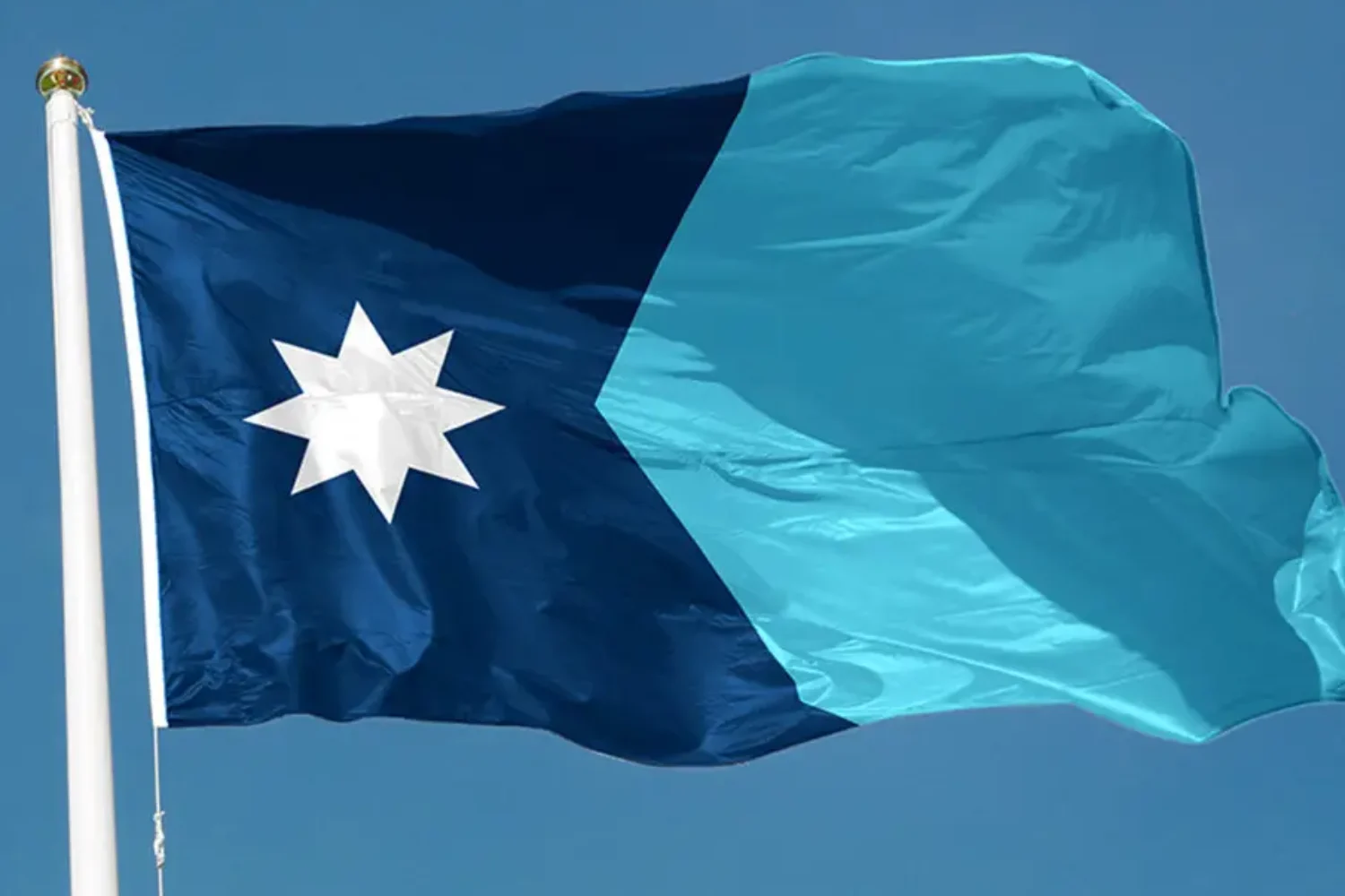 Minnesota new flag flying in the sky.